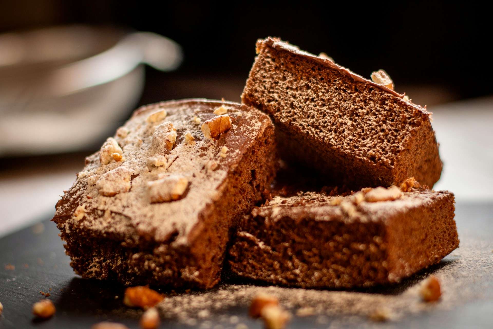a pile of brownies sitting on top of a table